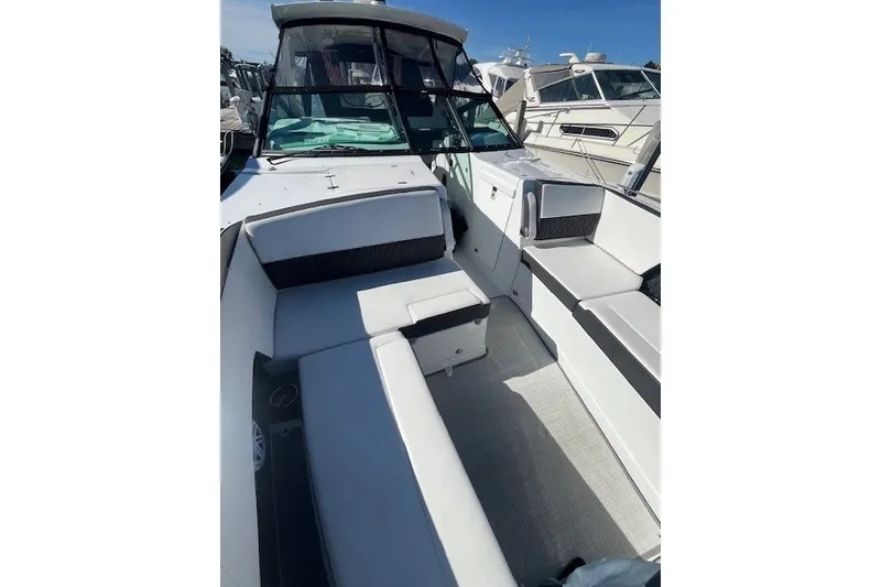 Slide: The Image of 2024 Monterey 378SS Super Sport boat interior with sleek seating and modern design. - 13