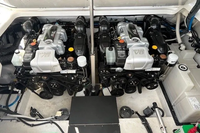 Slide: The Image of Twin V8 engines in a 2024 Monterey 378SS Super Sport boat engine compartment. - 20