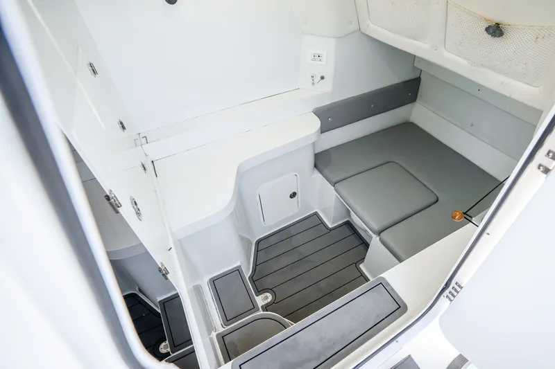 Slide: The Image of 2024 Conch 41 boat interior cabin with sleek seating and modern design. - 47