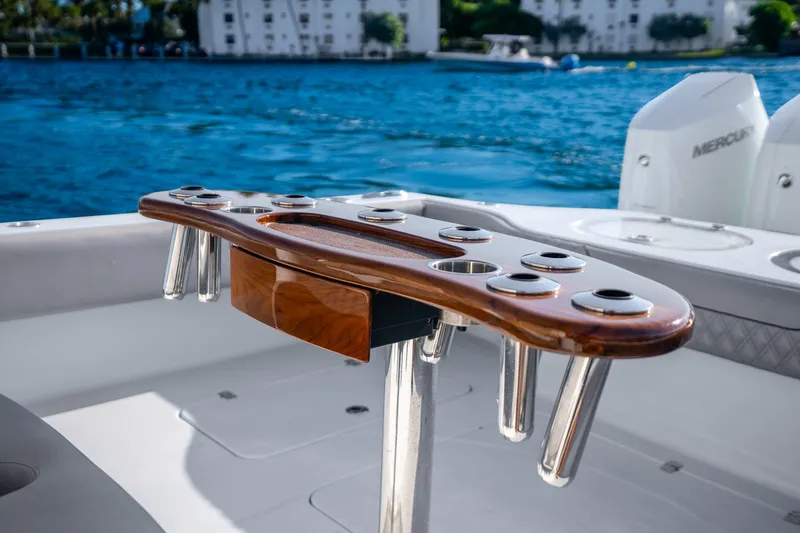 Slide: The Image of Luxury fishing rod holder on 2024 Conch 41 boat, with scenic waterfront view. - 20