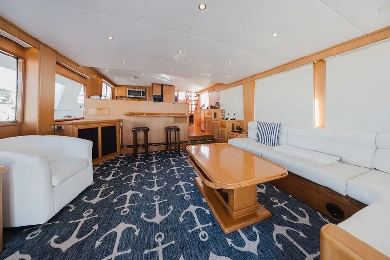 Slide: The Image of Luxurious interior of 1999 Ocean Alexander 680 Classicco yacht with elegant seating and nautical decor. - 23