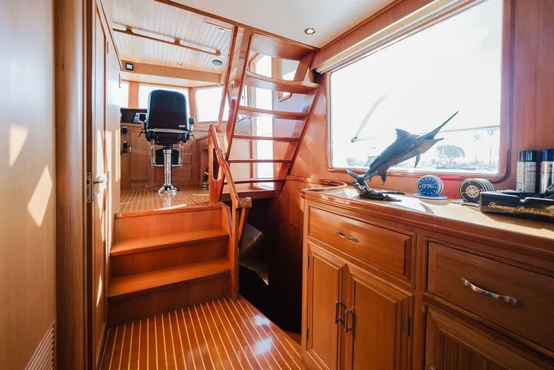 Slide: The Image of Luxurious interior of 1999 Ocean Alexander 680 Classicco yacht with wooden cabinetry and staircase. - 37