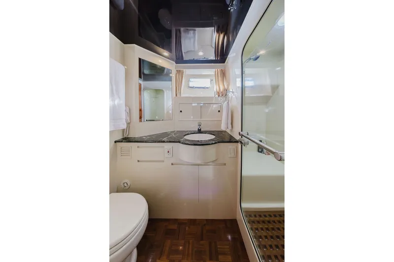 Slide: The Image of Luxurious bathroom in 1999 Ocean Alexander 680 Classicco yacht with elegant fixtures and wood flooring. - 72
