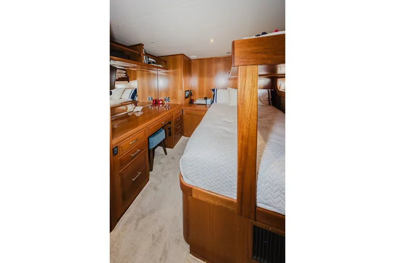 Slide: The Image of Luxurious 1999 Ocean Alexander 680 Classicco yacht cabin with wooden furnishings and cozy bedding. - 69