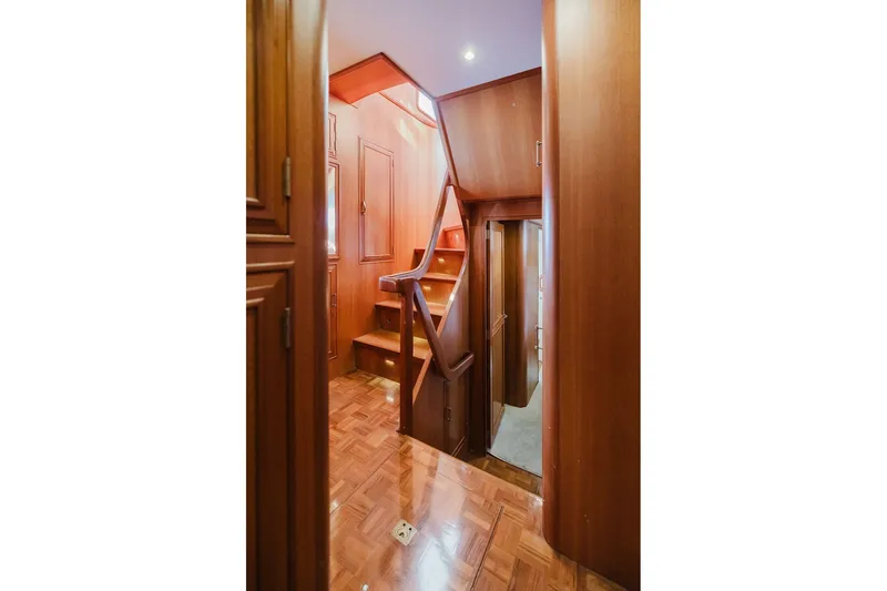 Slide: The Image of Interior of 1999 Ocean Alexander 680 Classicco yacht with wooden staircase and paneling. - 56