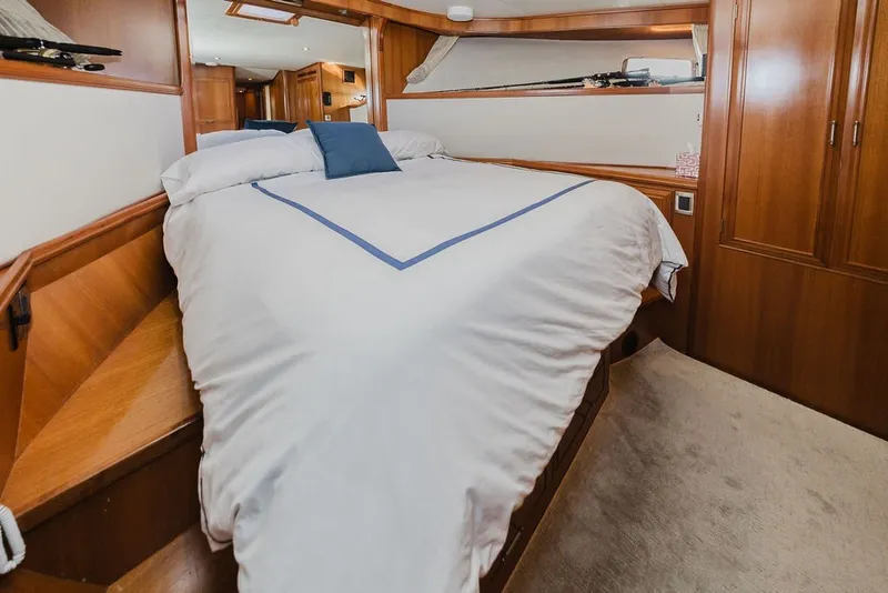 Slide: The Image of Luxurious bedroom interior of 1999 Ocean Alexander 680 Classicco yacht with elegant wood finish. - 65