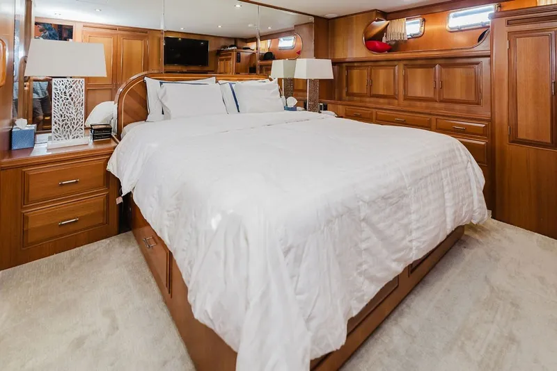 Slide: The Image of Luxurious bedroom interior of 1999 Ocean Alexander 680 Classicco yacht with wooden cabinetry. - 59