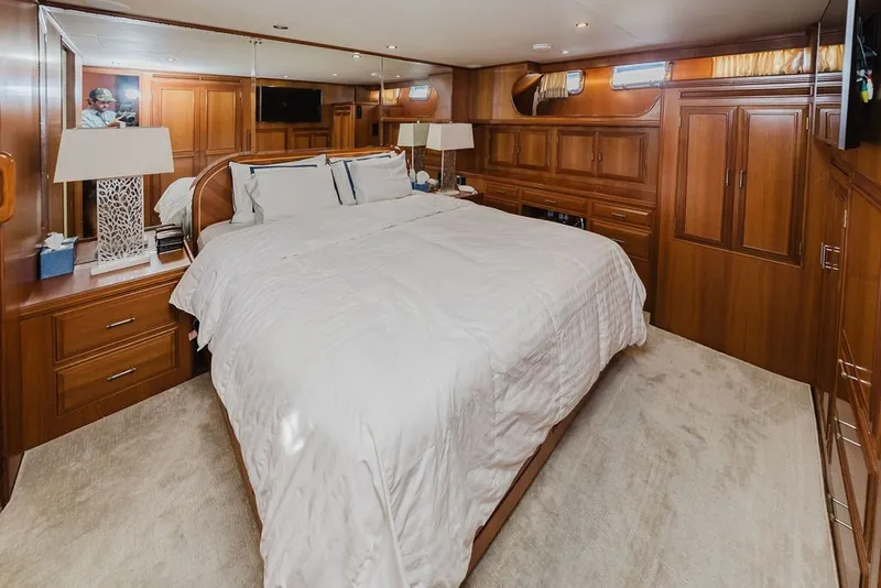 Slide: The Image of Luxurious bedroom interior of 1999 Ocean Alexander 680 Classicco yacht with elegant wood finish. - 63
