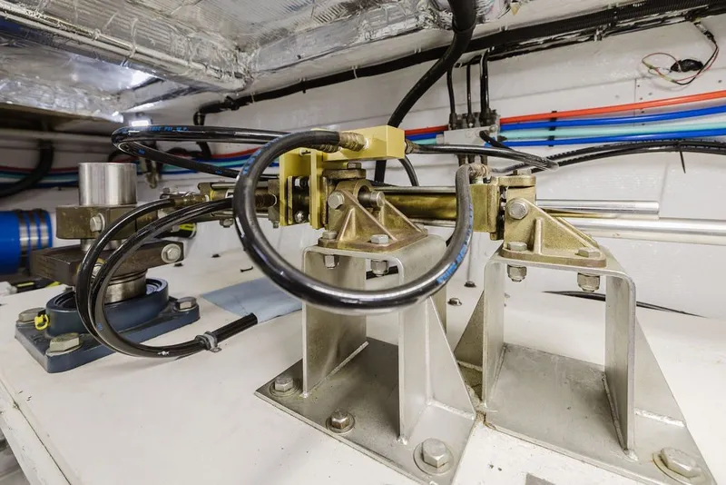 Slide: The Image of Engine room of 1999 Ocean Alexander 680 Classicco yacht, showcasing mechanical components and wiring. - 106
