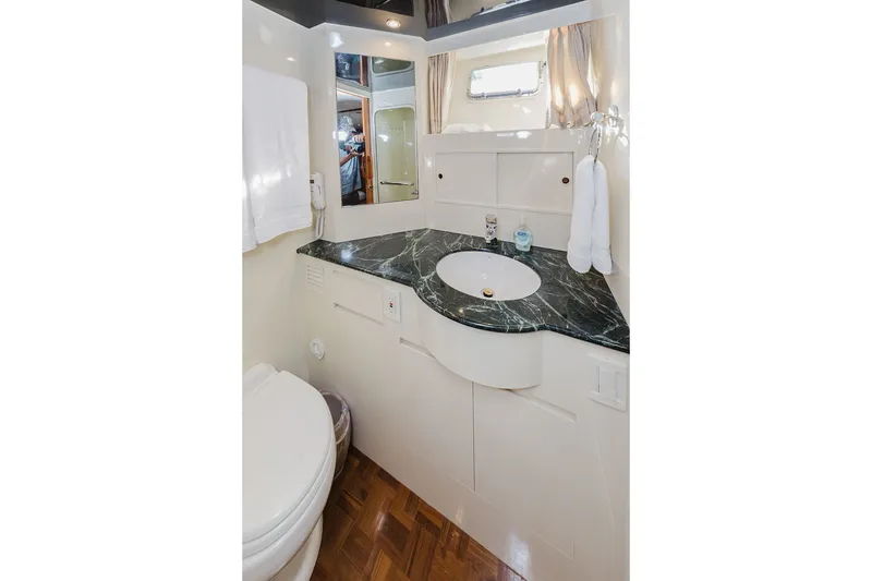 Slide: The Image of Luxurious bathroom in 1999 Ocean Alexander 680 Classicco yacht with marble countertop. - 61