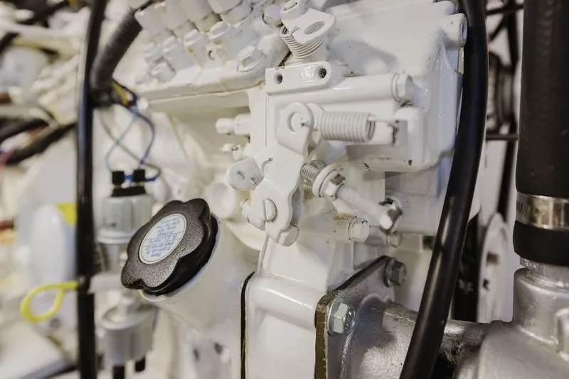 Slide: The Image of Close-up of 1999 Ocean Alexander 680 Classicco engine components, showcasing mechanical details. - 102