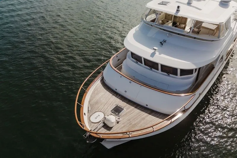 Slide: The Image of Aerial view of 1999 Ocean Alexander 680 Classicco yacht on calm water. - 125