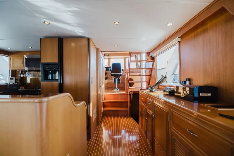 Slide: The Image of Luxurious interior of 1999 Ocean Alexander 680 Classicco yacht with wooden finishes and modern amenities. - 35
