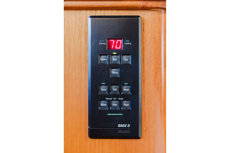 Slide: The Image of Control panel on 1999 Ocean Alexander 680 Classicco yacht, displaying temperature settings. - 54