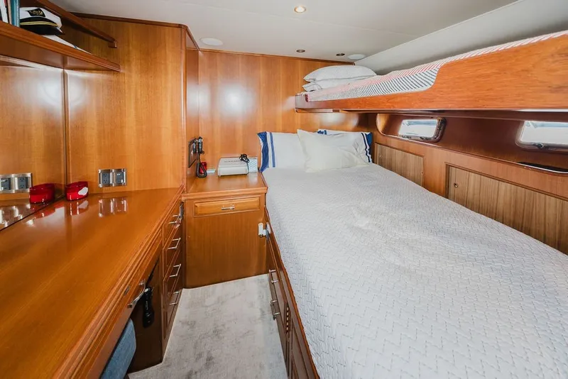 Slide: The Image of Luxurious 1999 Ocean Alexander 680 Classicco yacht cabin with wooden interior and cozy bedding. - 70