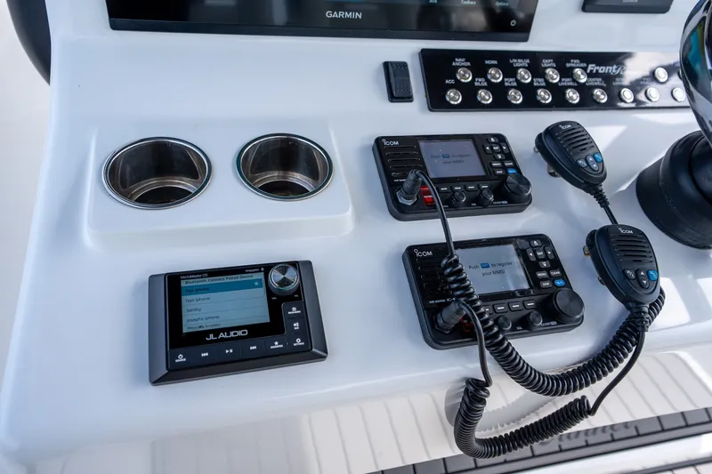 Slide: The Image of Control panel of 2023 Front Runner 39 Center Console with audio and communication devices. - 13