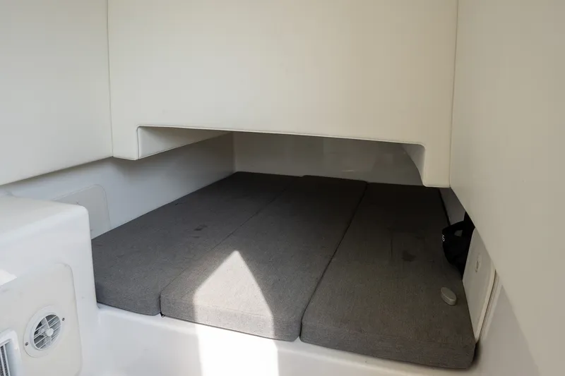 Slide: The Image of Interior cabin of 2023 Front Runner 39 Center Console with cushioned seating. - 47