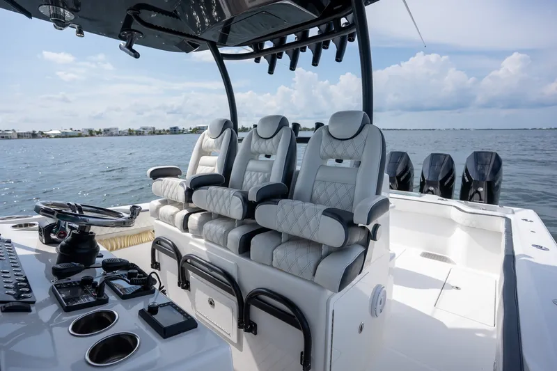 Slide: The Image of Luxurious 2023 Front Runner 39 Center Console boat interior with plush seating and advanced controls. - 30