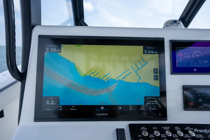 Slide: The Image of Garmin navigation display on 2023 Front Runner 39 Center Console boat dashboard. - 15