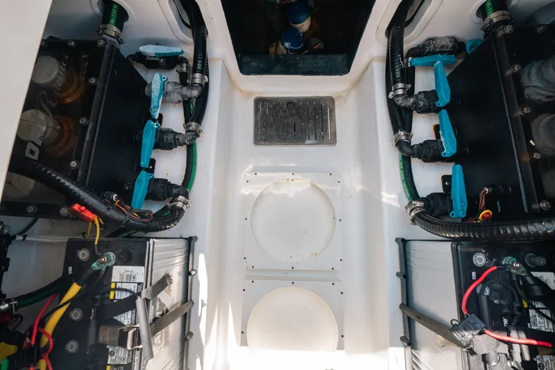 Slide: The Image of Engine compartment of 2023 Front Runner 39 Center Console boat, showcasing wiring and components. - 78