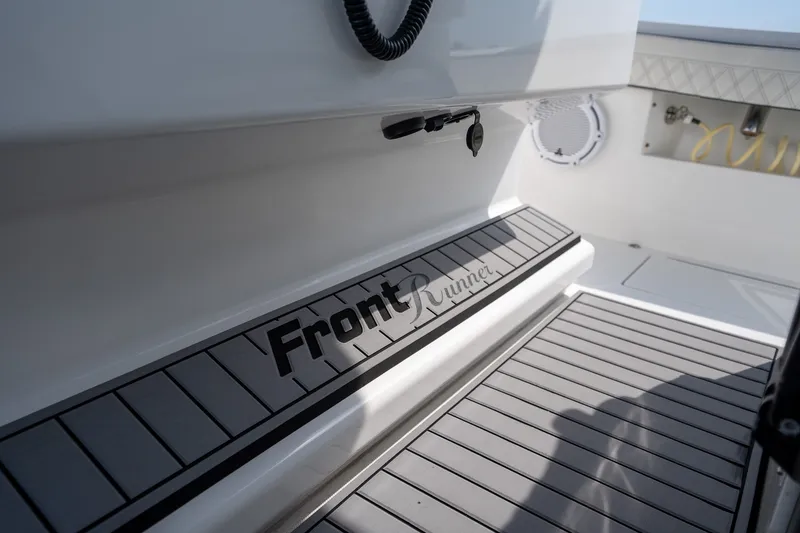 Slide: The Image of 2023 Front Runner 39 Center Console boat interior with branded flooring detail. - 35