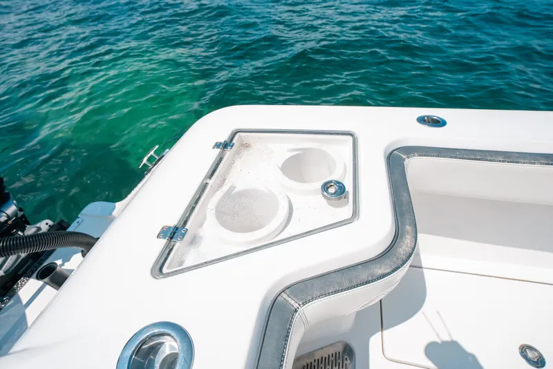 Slide: The Image of 2023 Front Runner 39 Center Console boat detail with cup holders on deck. - 58