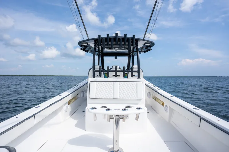 Slide: The Image of 2023 Front Runner 39 Center Console boat on open water under blue sky. - 22