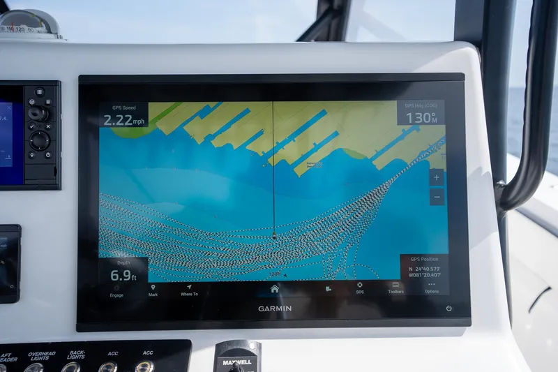 Slide: The Image of Garmin navigation display on 2023 Front Runner 39 Center Console boat, showing speed and depth. - 17