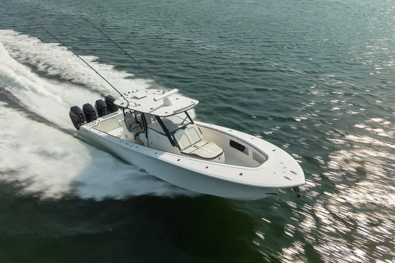 Slide: The Image of 2023 Front Runner 39 Center Console boat cruising on open water. - 2