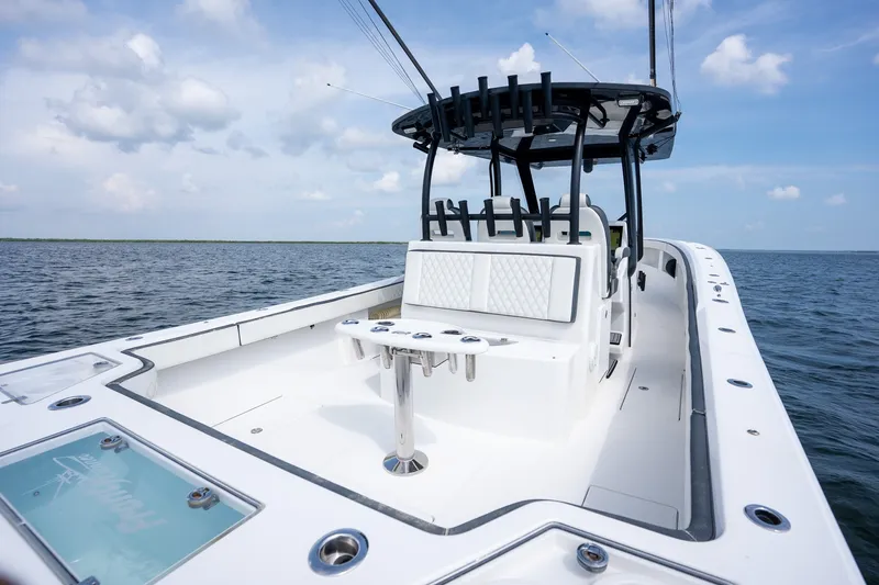 Slide: The Image of 2023 Front Runner 39 Center Console boat on open water under a clear sky. - 21