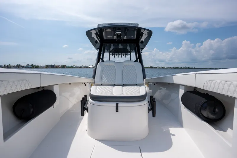 Slide: The Image of 2023 Front Runner 39 Center Console boat interior with seating, on a sunny day. - 40