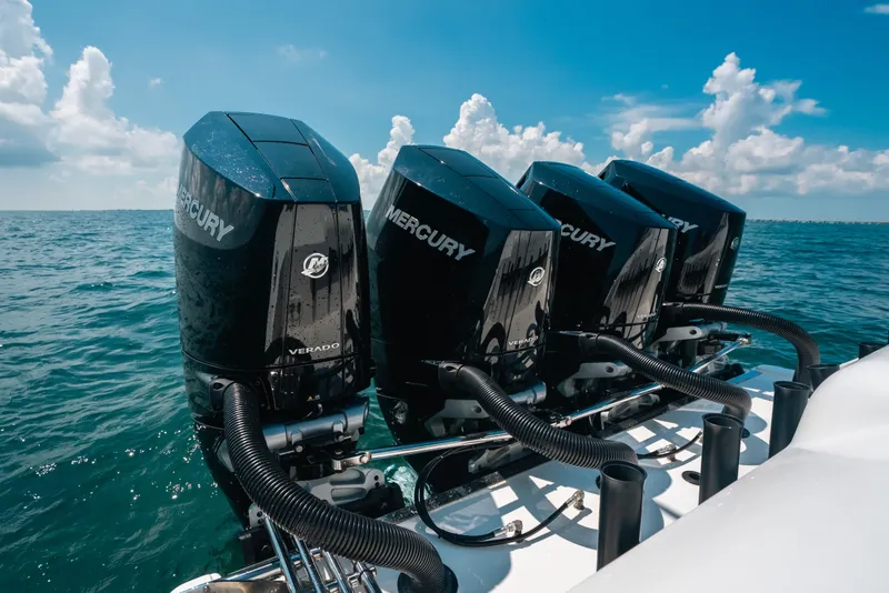 Slide: The Image of Four Mercury Verado outboard engines on a 2023 Front Runner 39 Center Console boat. - 59