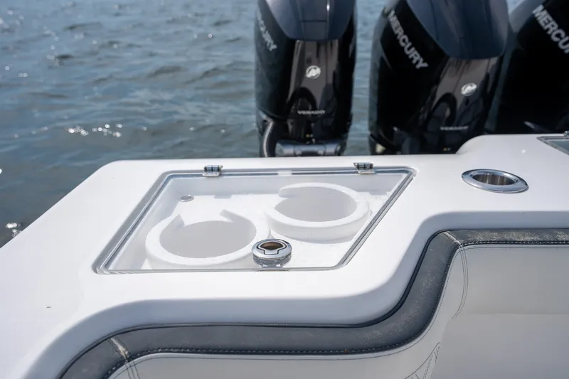 Slide: The Image of 2023 Front Runner 39 Center Console boat with dual Mercury engines and cup holders. - 43