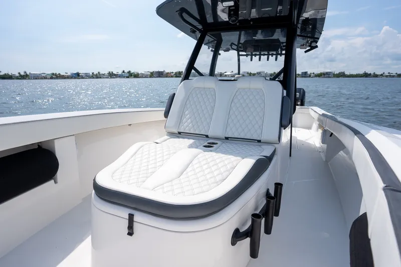 Slide: The Image of 2023 Front Runner 39 Center Console boat with luxurious seating on a sunny day. - 41