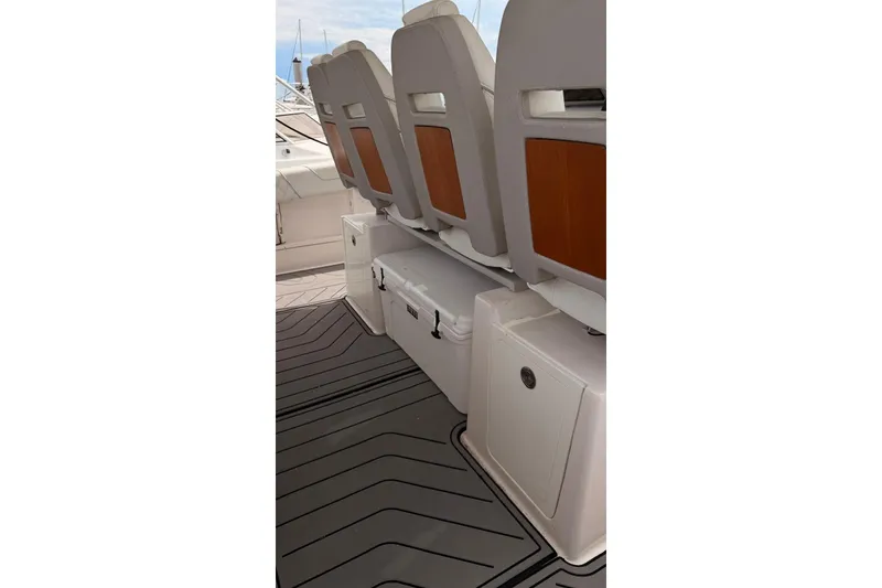 Slide: The Image of 2020 Regal 38 SAV boat interior with seating and storage compartments. - 41