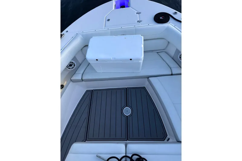 Slide: The Image of 2020 Regal 38 SAV boat interior with seating and storage area. - 35