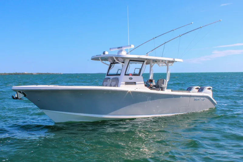 The Image of 2023 Sea Pro 320 DLX Offshore boat cruising on open water. - 0