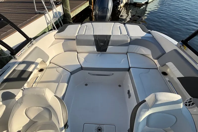Slide: The Image of 2022 Chaparral 23 SSi OB boat interior with spacious seating and modern design. - 17