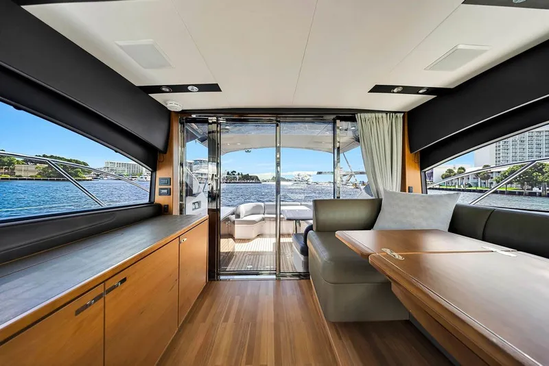 Slide: The Image of Luxurious interior of 2015 Princess V48 yacht with scenic water view. - 24