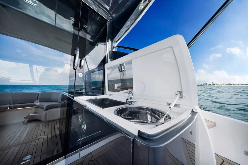 Slide: The Image of Luxury yacht Princess V48 (2015) with sleek interior and ocean view. - 16