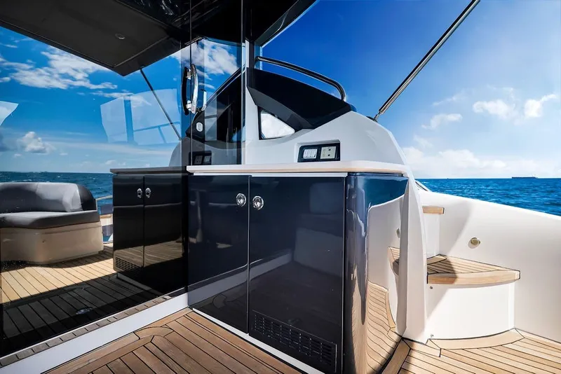 Slide: The Image of Luxurious 2015 Princess V48 yacht interior with sleek design and ocean view. - 14