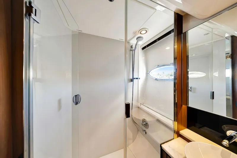 Slide: The Image of Luxurious bathroom in 2015 Princess V48 yacht with modern shower and sleek design. - 46