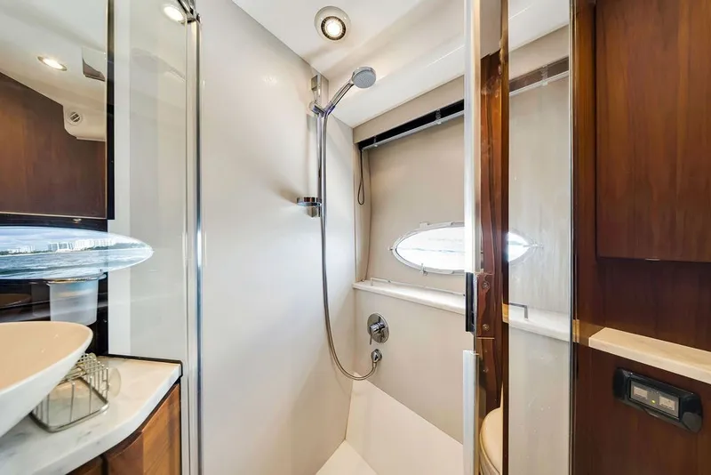 Slide: The Image of Luxurious bathroom in 2015 Princess V48 yacht with modern shower and elegant fixtures. - 54