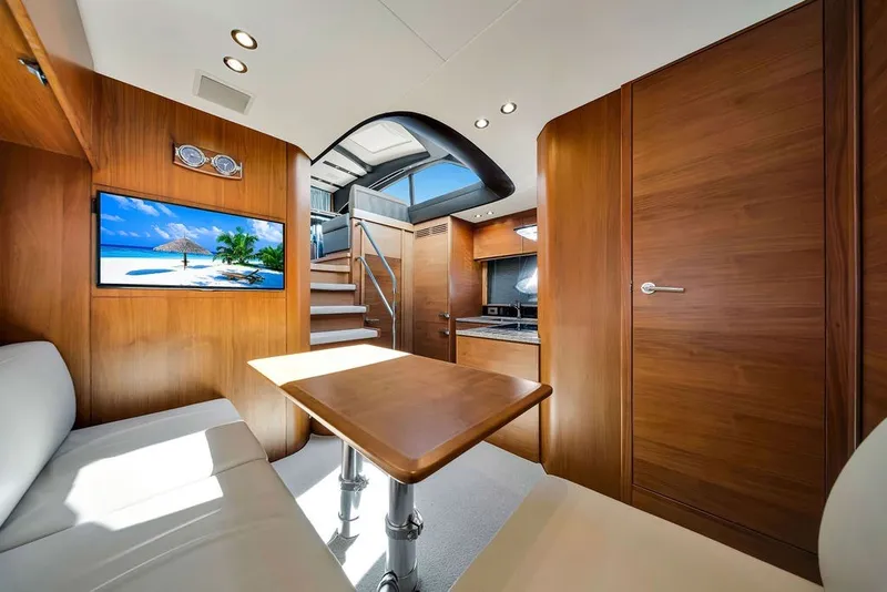 Slide: The Image of Luxurious interior of 2015 Princess V48 yacht with wood finish and modern amenities. - 36
