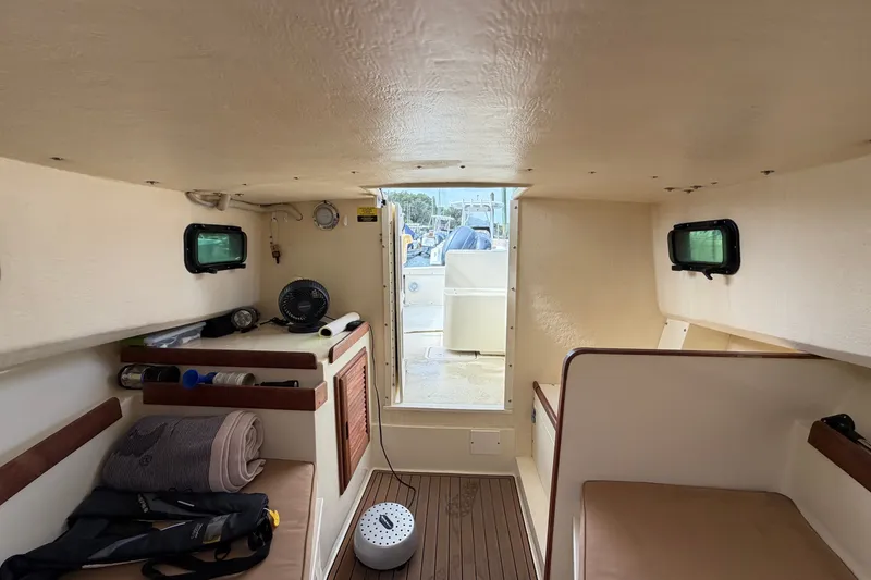 Slide: The Image of Interior of 2017 Seaway Offshore boat by Eastern Boats Inc., featuring cozy cabin space. - 19