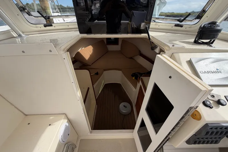 Slide: The Image of 2017 Seaway Offshore cabin interior with seating and navigation equipment. - 17