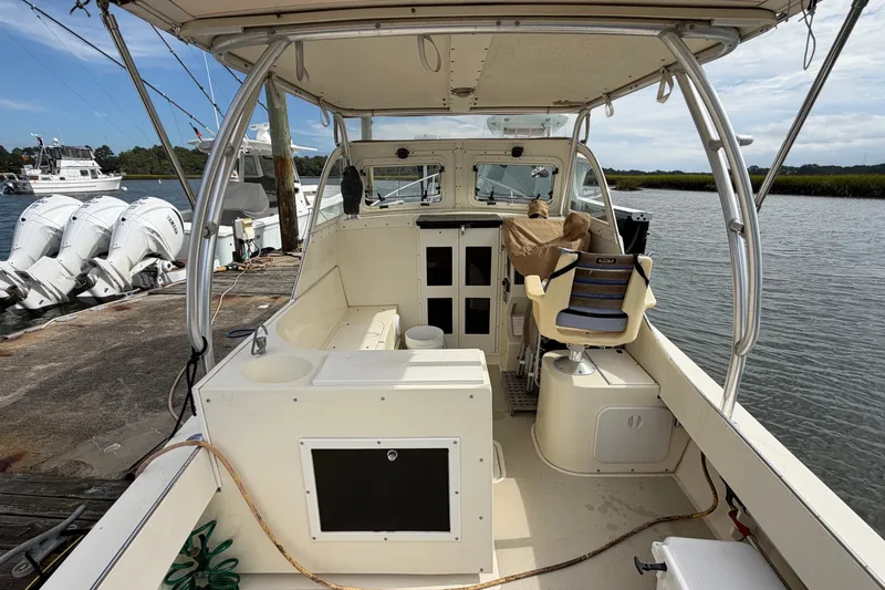 Slide: The Image of 2017 Seaway Offshore boat by Eastern Boats Inc., docked with outboard motors visible. - 9