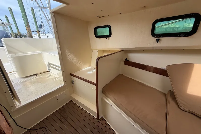 Slide: The Image of 2017 Seaway Offshore boat interior with seating and windows, by Eastern Boats Inc. - 21