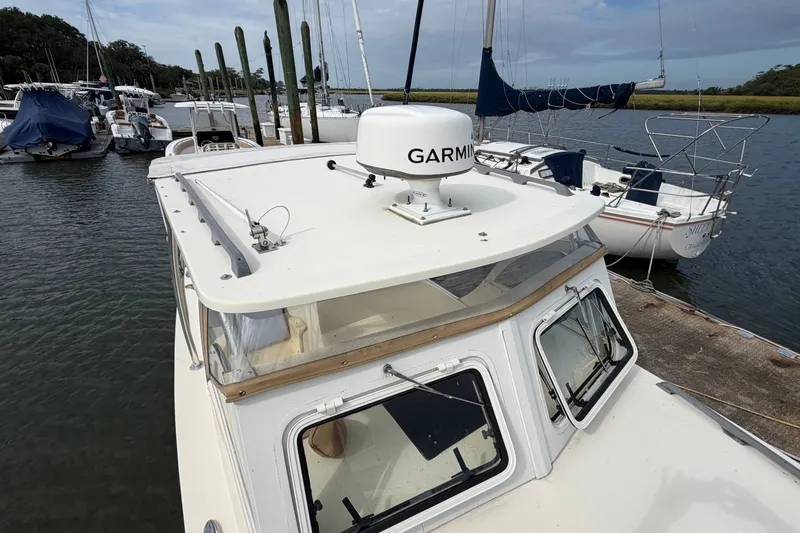 Slide: The Image of 2017 Seaway Offshore boat by Eastern Boats Inc. docked, featuring Garmin equipment. - 7