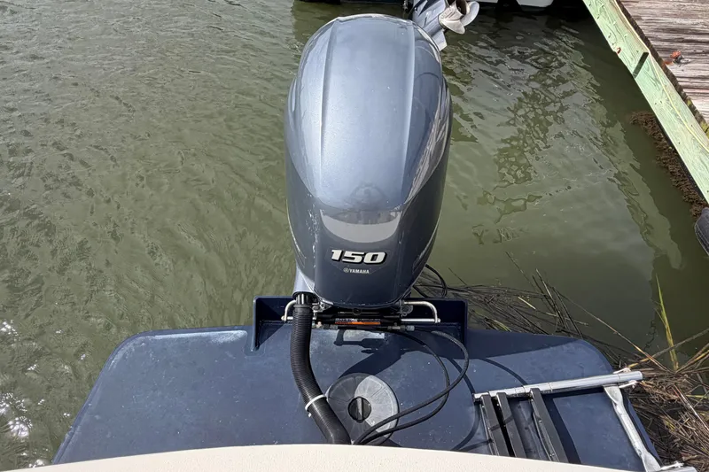 Slide: The Image of Outboard motor on 2017 Seaway Offshore boat by Eastern Boats Inc., docked in water. - 25